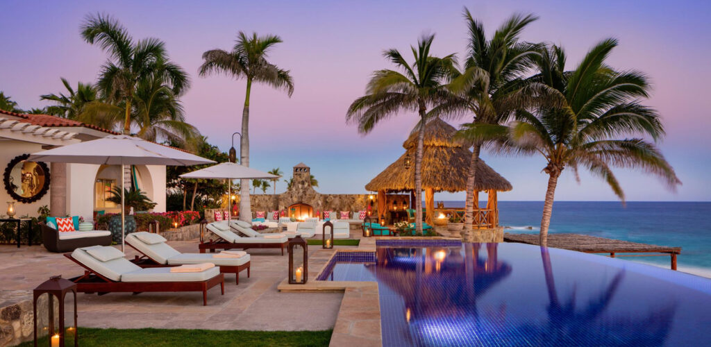 One & Only Palmilla loung chairs infinity pool overlooking ocean